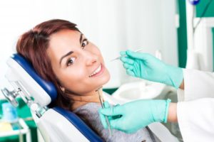 Woman in dentist's chair.